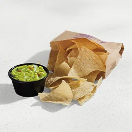 Menu 129 Warm-and-crispy tortilla chips with a side of guacamole.