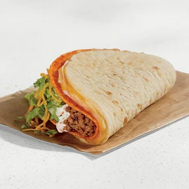Menu 116 A Doritos® Cheesy Gordita Crunch - Nacho Cheese, filled with a blend of cheeses, wrapped around a Nacho Cheese Doritos® shell with seasoned beef, Spicy Ranch sauce, lettuce, and shredded cheddar cheese.