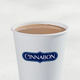 Menu 67 A Hot Cinnabon Delights® Coffee served in a Taco Bell cup.