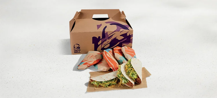 Menu 259 Soft Taco Party Pack featuring 3 soft tacos and 5 wrapped items placed in front of a Taco Bell-branded box.