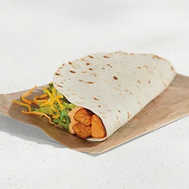Menu 41 A Spicy Potato Soft Taco, filled with crispy potato bites, lettuce, shredded cheddar cheese, and Creamy Chipotle sauce.