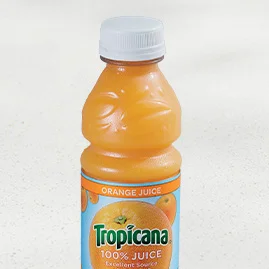 Menu 247 Tropicana® Orange Juice, served in a clear plastic cup.