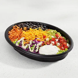 Menu 135 A Veggie Bowl filled with seasoned rice, black beans, lettuce, shredded purple cabbage, freshly prepared pico de gallo, guacamole, Avocado Ranch sauce, reduced-fat sour cream, and cheddar cheese.