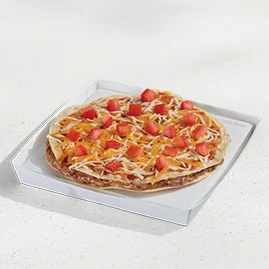 Menu 144 A Veggie Mexican Pizza on a white paperboard box, featuring Refried Beans layered between two crispy, flour tortilla shells with Mexican Pizza sauce, diced tomatoes, and a blend of cheeses.