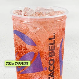 Tropical Punch Rockstar Energy Refresca with ice and orange slice in clear cup, featuring Rockstar Focus Energy branding—200 mg caffeine.